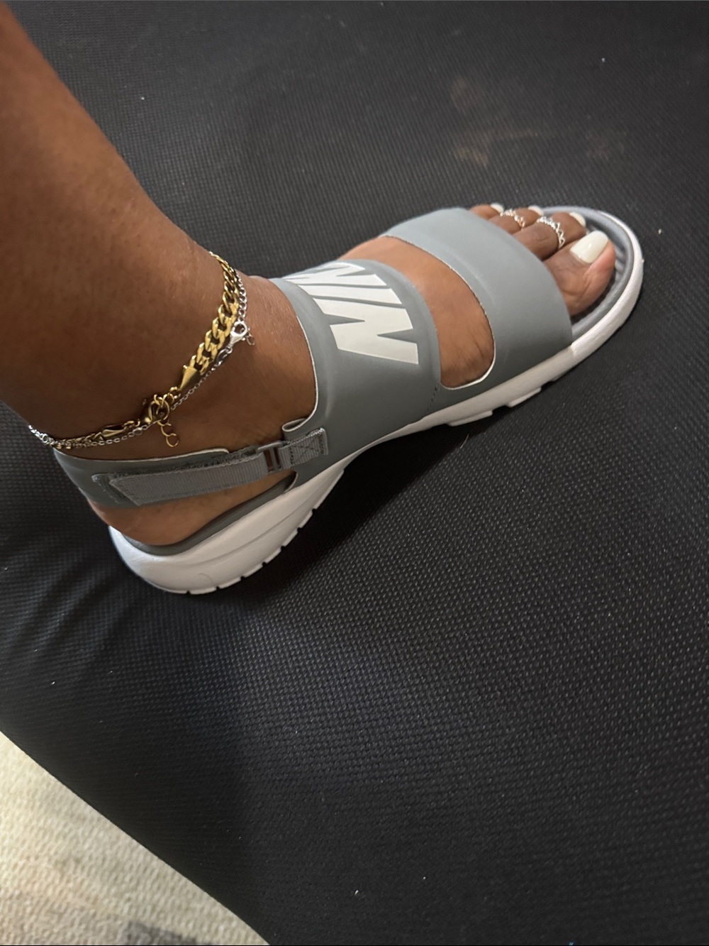 Nike Women’s Gray Sandal with White Sole